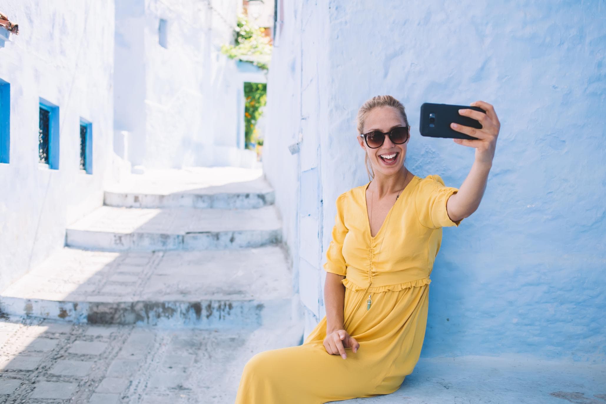 A traveller keeping in touch with her community